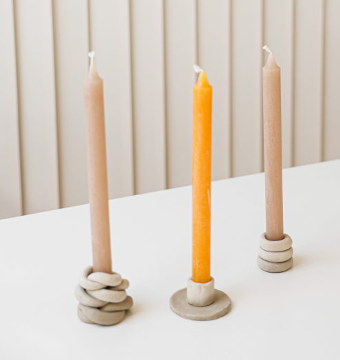 Ceramic candlestick holders and candles