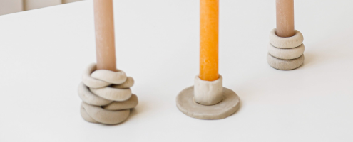 Ceramic candlestick holders and candles